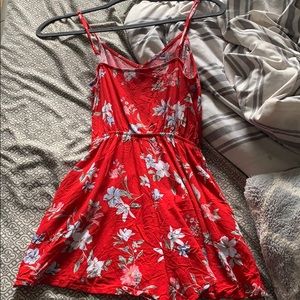 A loose red romper